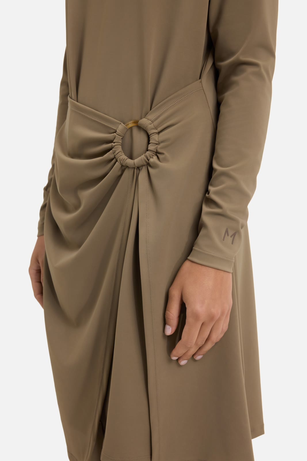 Merrachi: a signature draped look from the collection